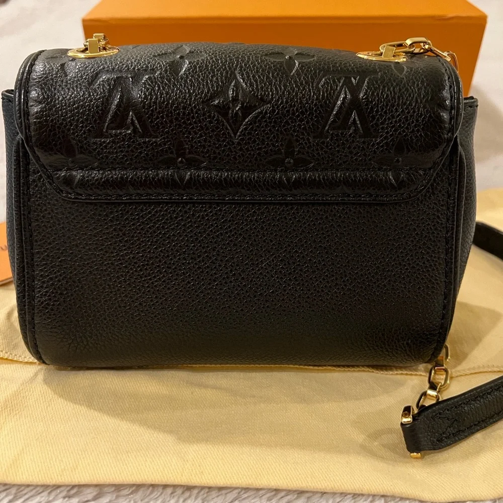 Authentic Louis Vuitton Empreinte St. Germaine BB Noir black leather bag - Picture 5 of 9